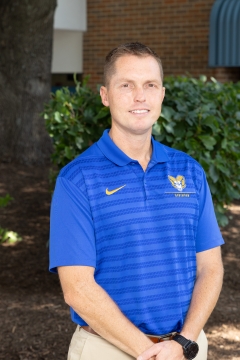 Jason Kagarise in a blue polo